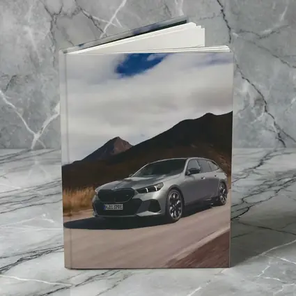 BMW i5 Touring Gray Mountain Road Drive