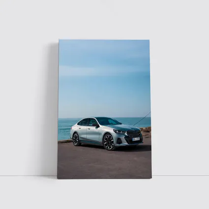 BMW i5 Sedan Parked by the Ocean