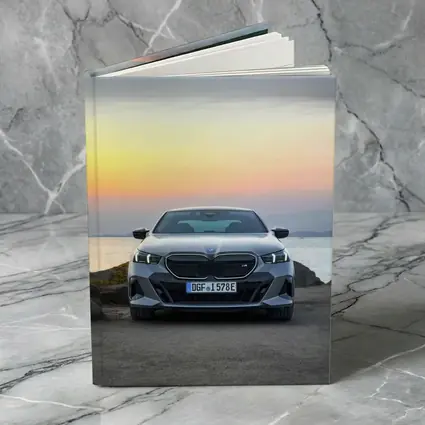 BMW i5 M60 Sunset Coastal Front View