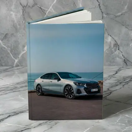 BMW i5 Sedan Parked by the Ocean