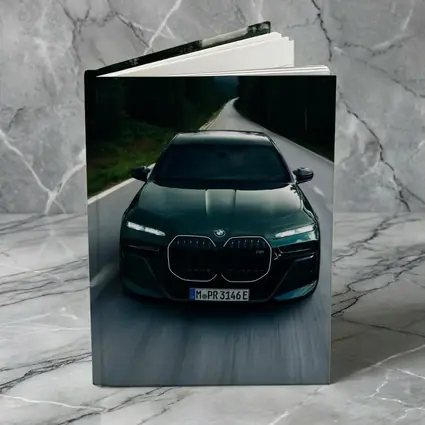 BMW i7 M70 Dark Green Forest Road