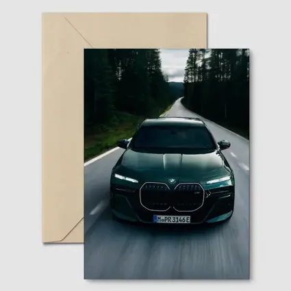 BMW i7 M70 Dark Green Forest Road
