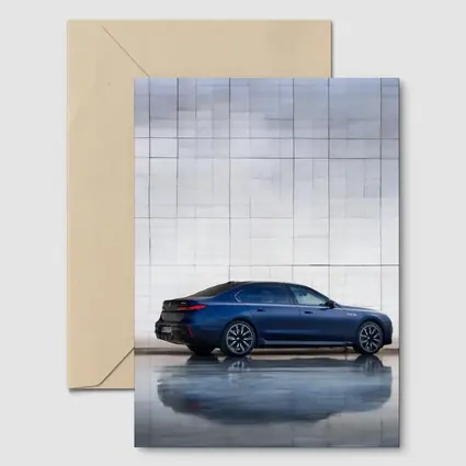 BMW i7 Blue Sedan Against Silver Wall