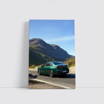 BMW i7 Green Sedan Mountain Road Drive