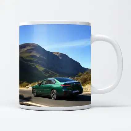 BMW i7 Green Sedan Mountain Road Drive