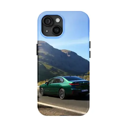 BMW i7 Green Sedan Mountain Road Drive