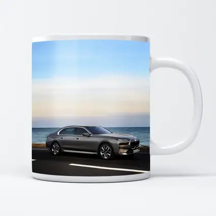 BMW i7 Gray Sedan by the Ocean