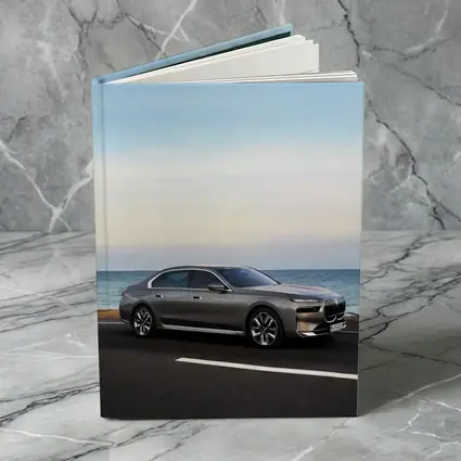 BMW i7 Gray Sedan by the Ocean