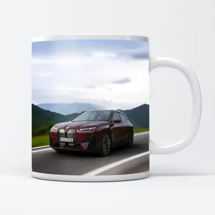 BMW iX Red SUV Mountain Road Drive