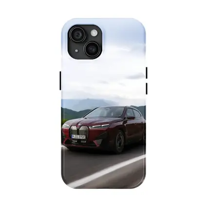 BMW iX Red SUV Mountain Road Drive