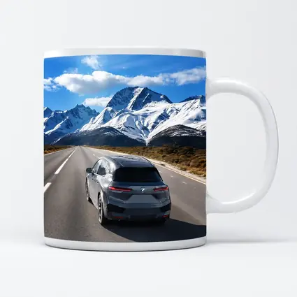 BMW iX SUV on Mountain Road