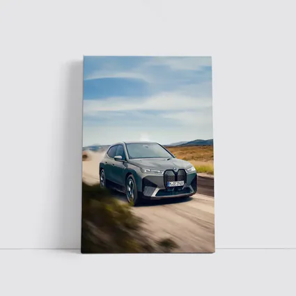 BMW iX Driving Dusty Desert Road