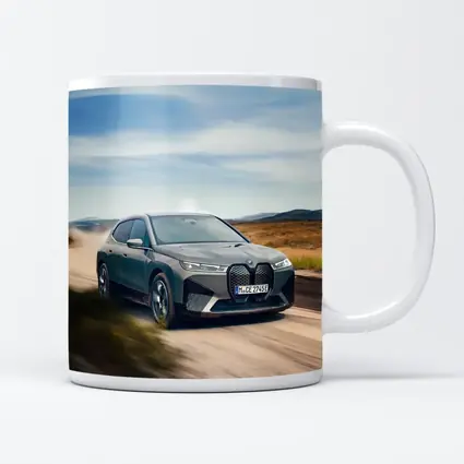 BMW iX Driving Dusty Desert Road