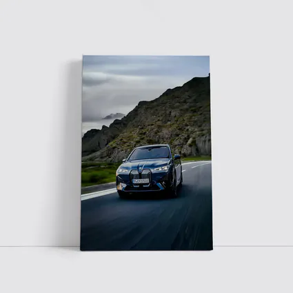 BMW iX Driving Mountain Road Blue