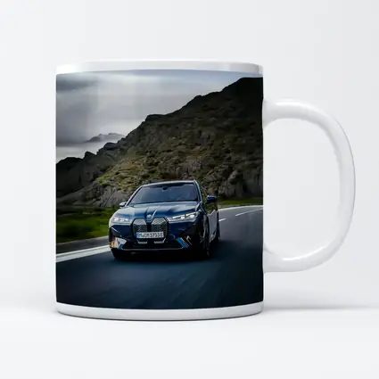 BMW iX Driving Mountain Road Blue