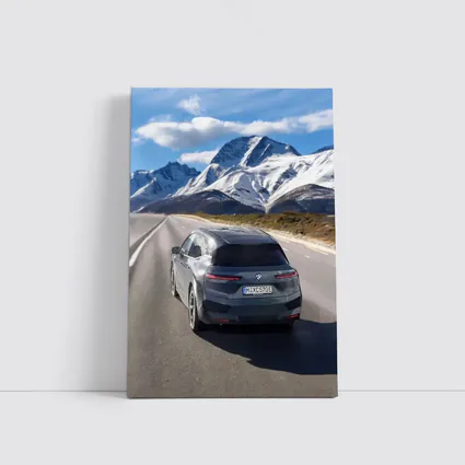BMW iX Gray on Mountain Highway Road