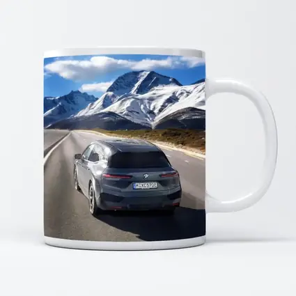 BMW iX Gray on Mountain Highway Road
