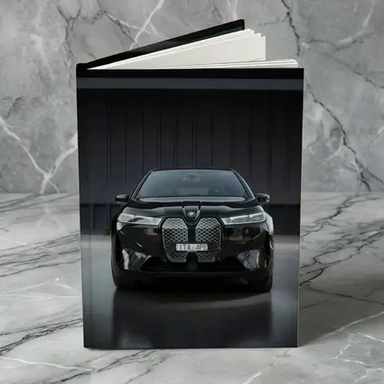 BMW iX Black Front View Dark Garage