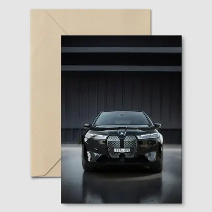 BMW iX Black Front View Dark Garage