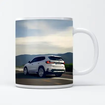 BMW iX1 SUV Driving Mountain Road