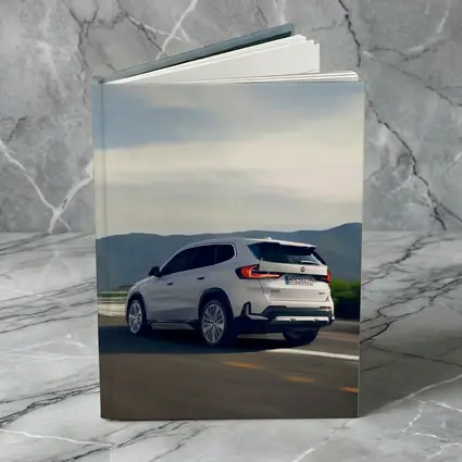 BMW iX1 SUV Driving Mountain Road