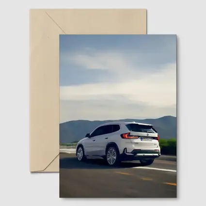 BMW iX1 SUV Driving Mountain Road