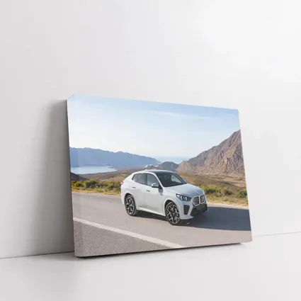 BMW iX2 White SUV Mountain Road