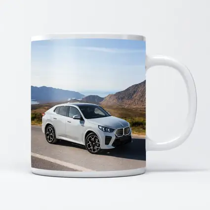 BMW iX2 White SUV Mountain Road