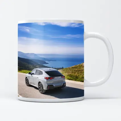 BMW iX2 Grey Rear Coastal Mountain Road