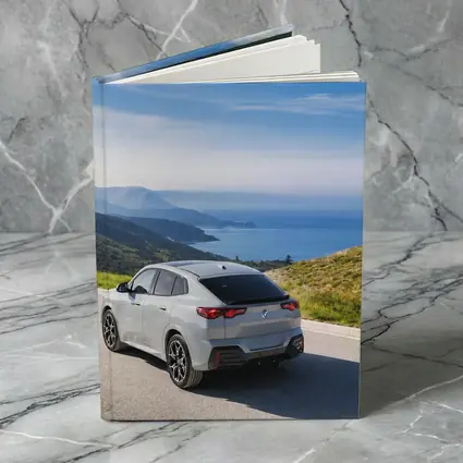 BMW iX2 Grey Rear Coastal Mountain Road