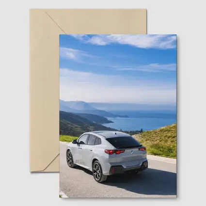 BMW iX2 Grey Rear Coastal Mountain Road