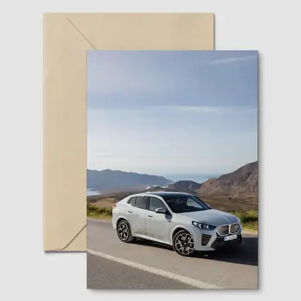 BMW iX2 Silver Coastal Mountain Road
