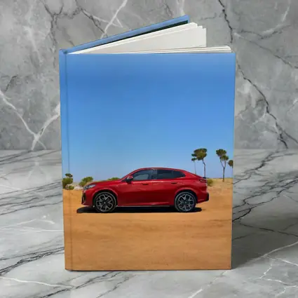 BMW iX2 Red Sandy Desert Blue Sky