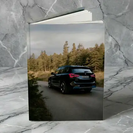 BMW iX3 Black SUV Forest Road