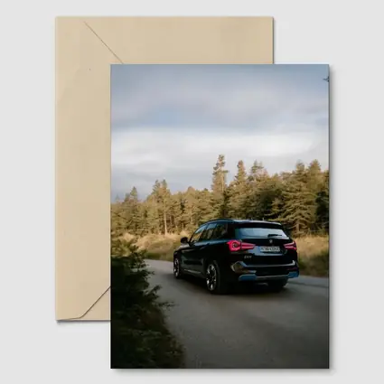 BMW iX3 Black SUV Forest Road