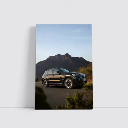 BMW iX3 Black SUV Mountain Backdrop