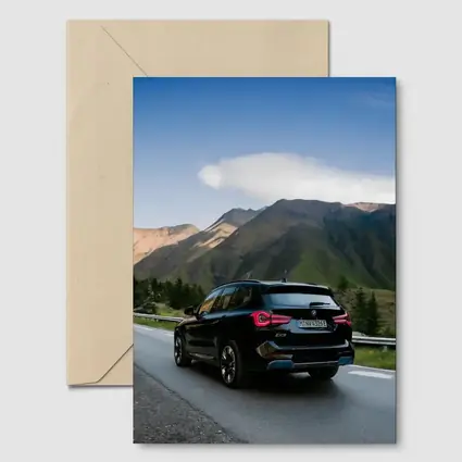 BMW iX3 Black SUV Mountain Road Drive