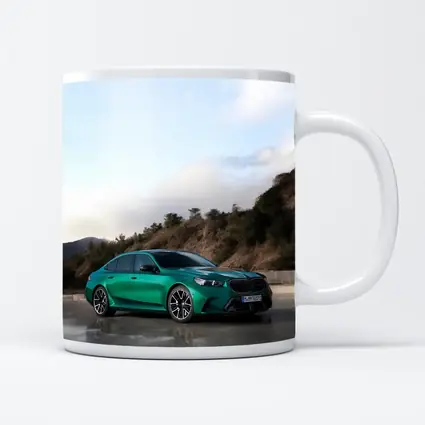 BMW M5 Green Sedan Hillside Setting