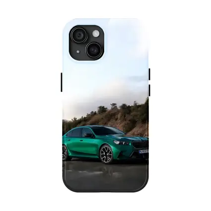BMW M5 Green Sedan Hillside Setting