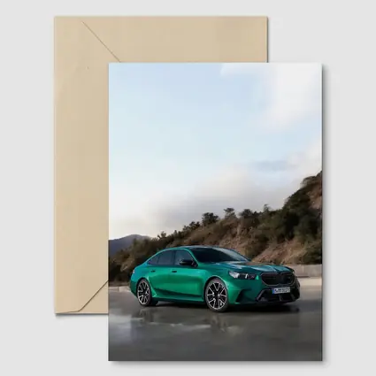 BMW M5 Green Sedan Hillside Setting