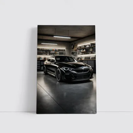 Black BMW Sedan Parked Inside Dark Garage