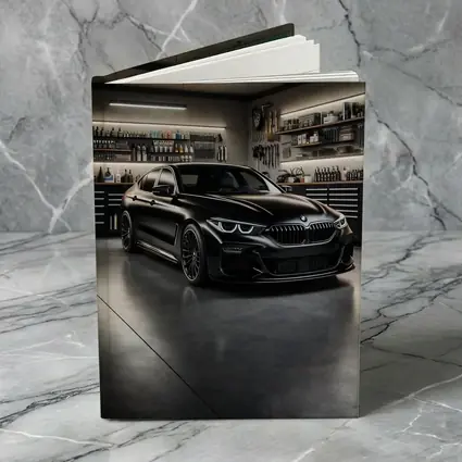 Black BMW Sedan Parked Inside Dark Garage