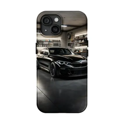 Black BMW Sedan Parked Inside Dark Garage