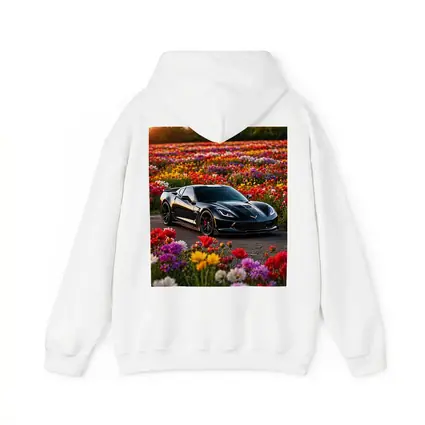 Black Chevrolet Corvette Parked Among Colorful Flowers