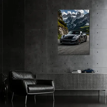 Black Porsche Boxster on Alpine Mountain Road