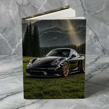 Black Porsche Cayman GT4 Mountain Backdrop