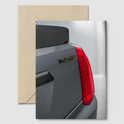 Cadillac V Series Badge Gray Car Detail