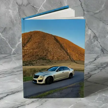 Cadillac CTS-V Silver Sedan Mountain Road
