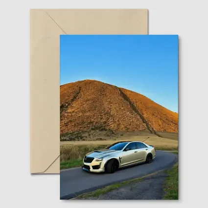 Cadillac CTS-V Silver Sedan Mountain Road