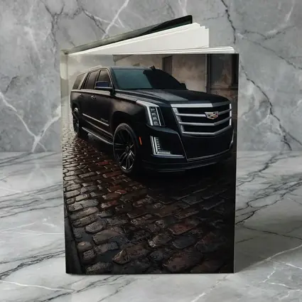 Cadillac Escalade Black SUV Wet Cobblestone Street